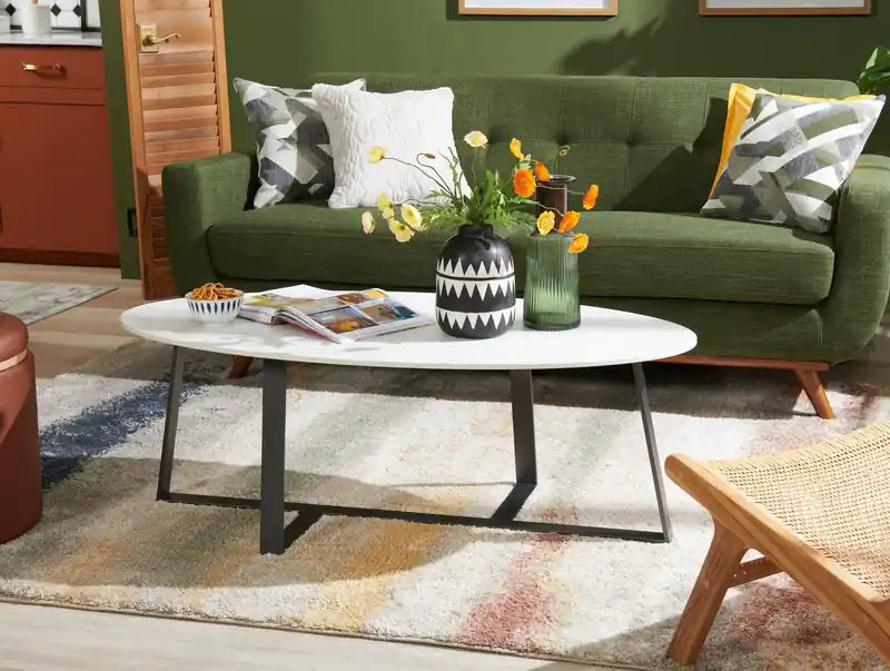 . Table basse ovale moderne 51 - Pierre frittée blanche avec pieds en métal gris foncé